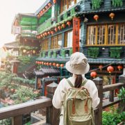 Young Woman Admiring A Temple In Taiwan, East Asia
